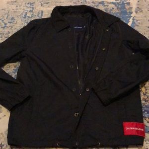Calvin Klein small men’s light jacket with pull string in the bottom